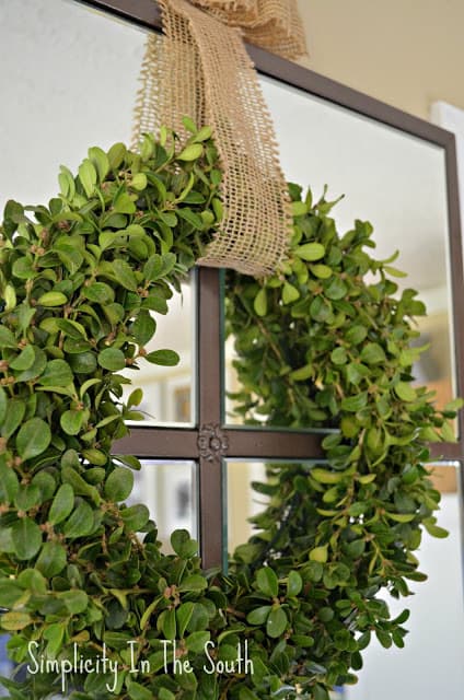 boxwood wreath on mirror