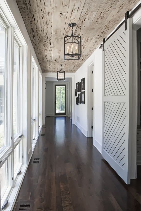 Rustic Hallway with sliding barn doors