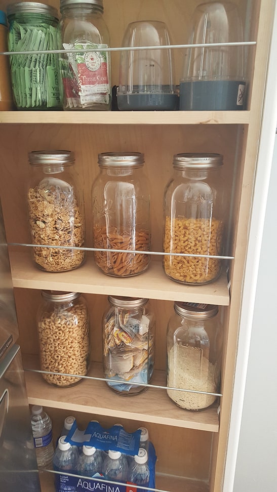 Slide out pantry organizing mason jars