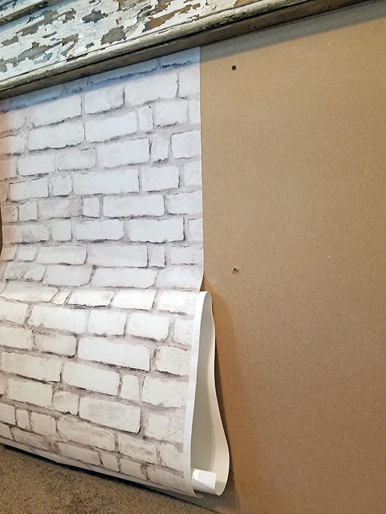 diy fireplace with faux brick backing