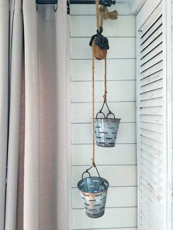 Kitchen Storage solutions, metal hanging olive buckets on pulley so cute!