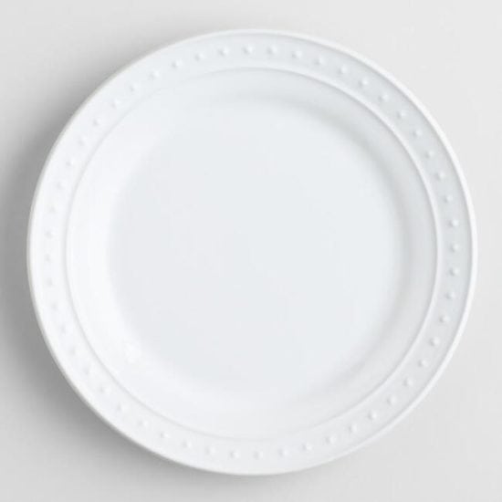 white textured plates table settings