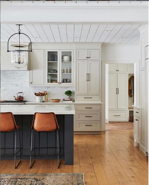 kitchen cabinets that sit on the counter and plank ceiling