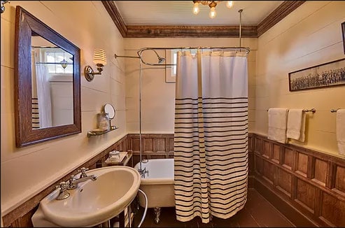 bathroom with freestanding clawfoot tub and shower