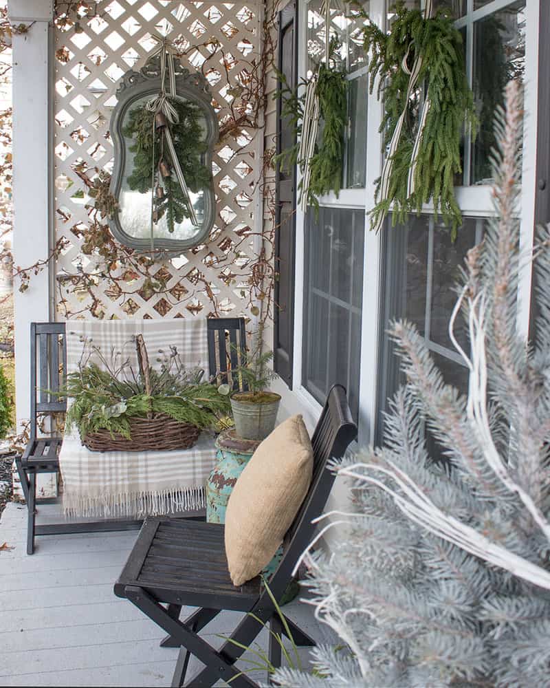 Beautiful small front porch decorating ideas on a budget!  Love the all natural elements.