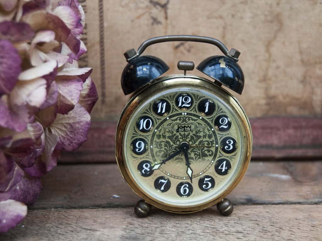 one of a kind miniature antique alarm clock from small village in France!