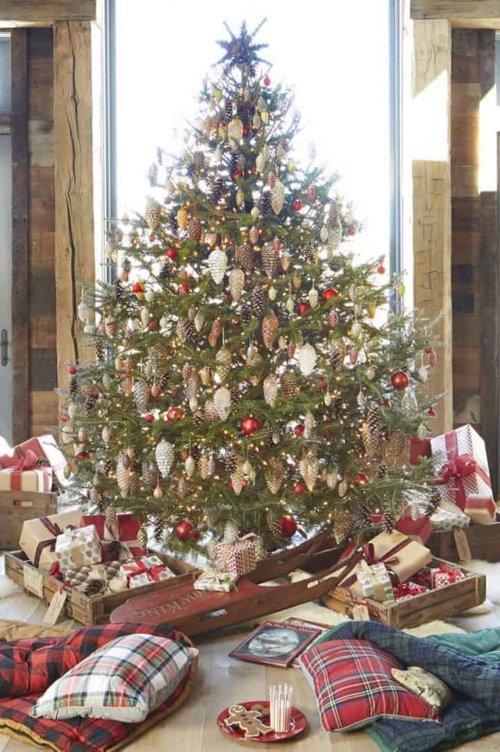 natural Christmas trees with pinecone ornamentsvia