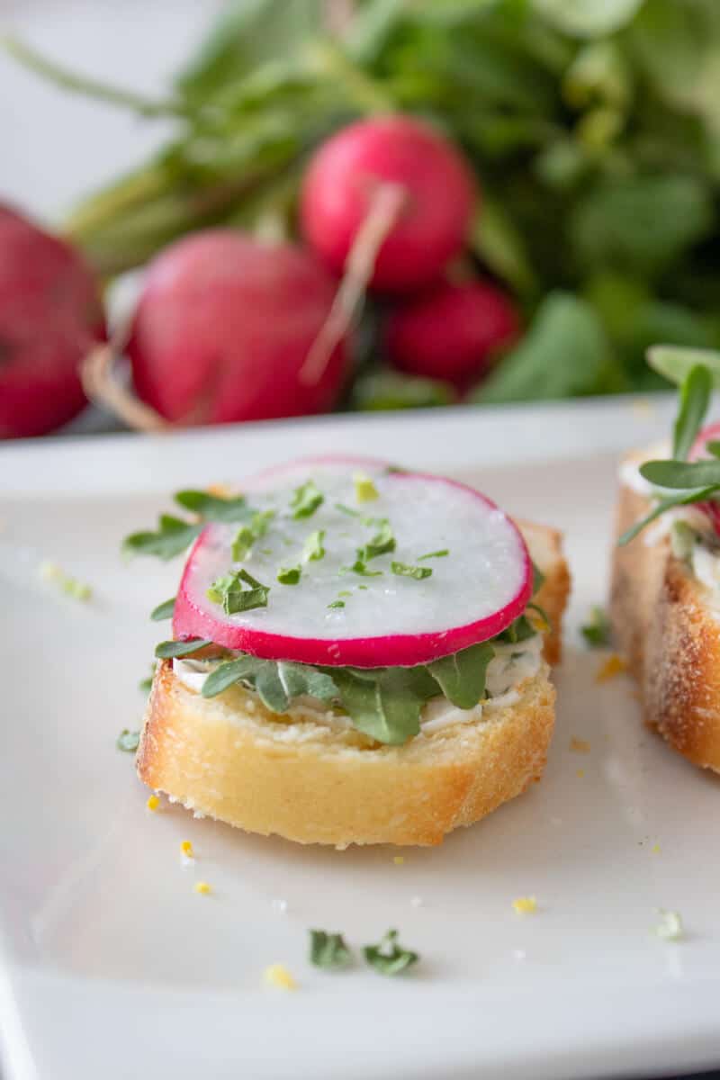 crostini with herb butter and arugula