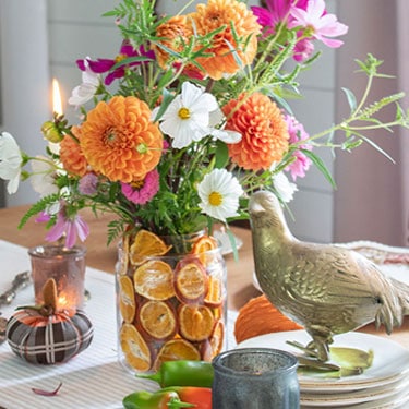 DIY Fall Centerpiece With Flowers and Dried Fruit