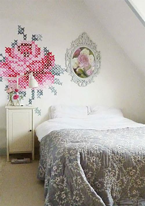 cross-stitch-painting-on-bedroom-wall