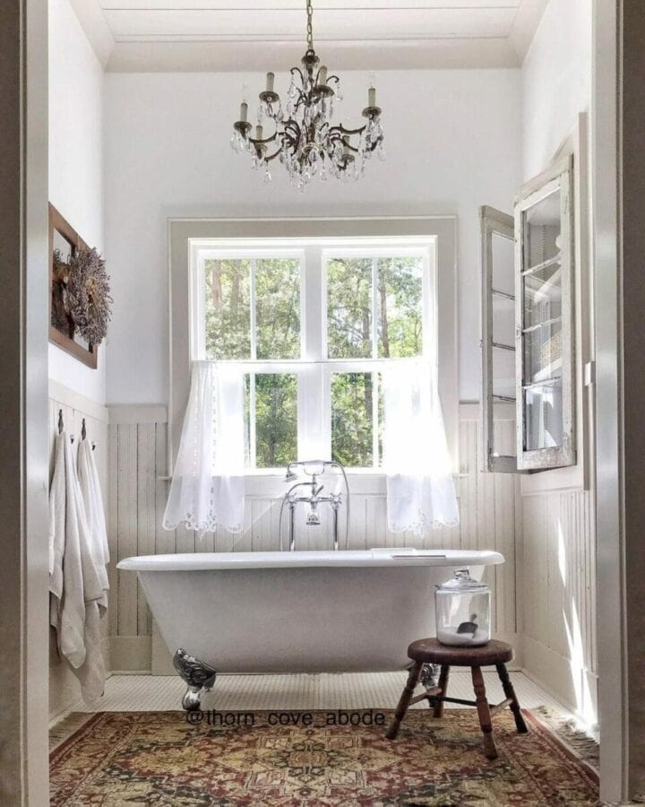 white and gray bathroom with clawfoot tub