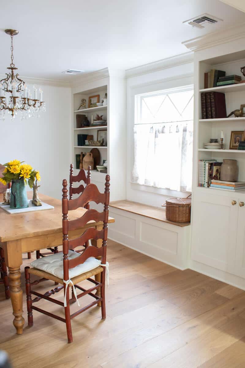 Vintage Country Dining Room With Custom Bookshelves and Built-In Bench ...