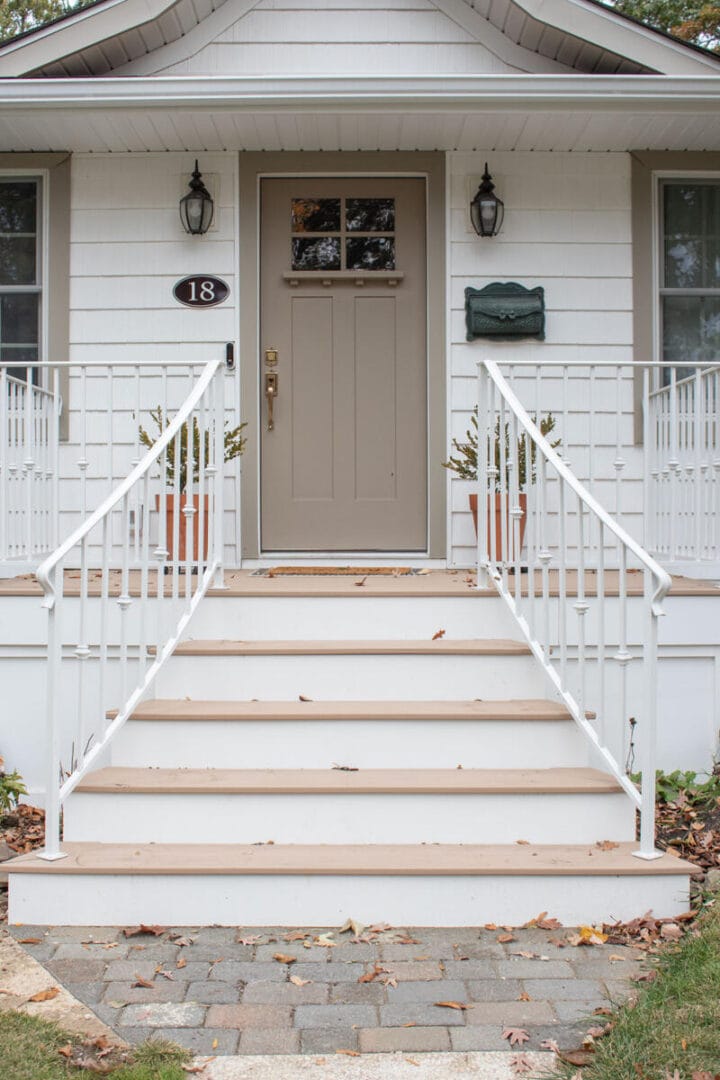curved railings on front porch steps - ranch house exterior ideas