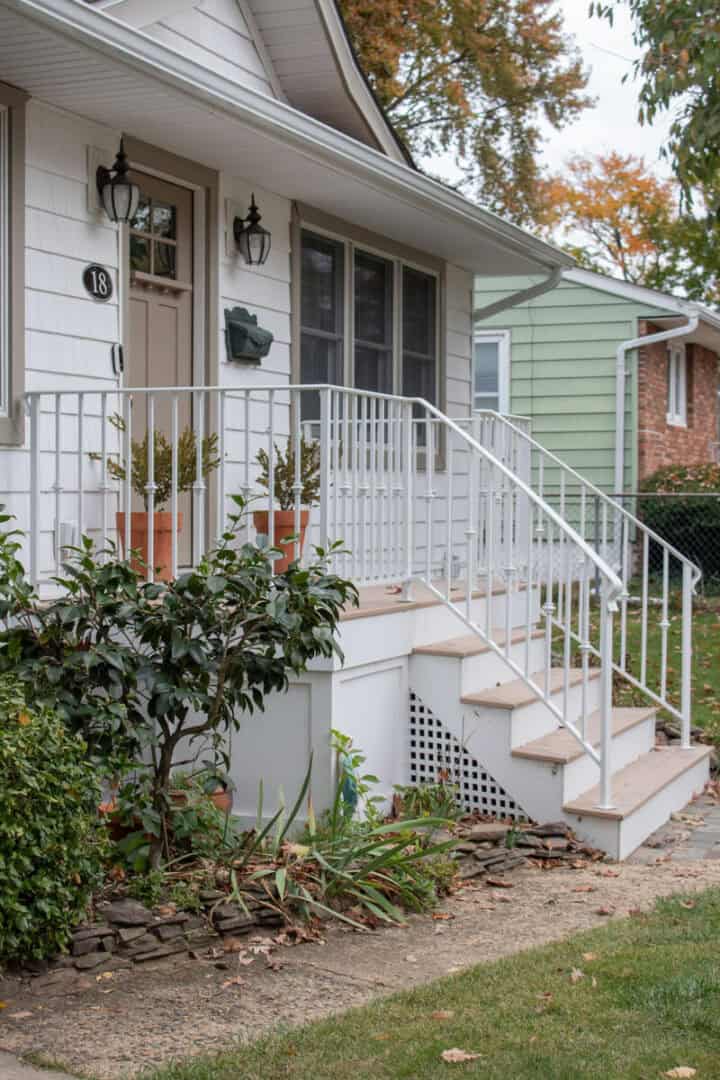raised ranch house front steps with board and batten trim
