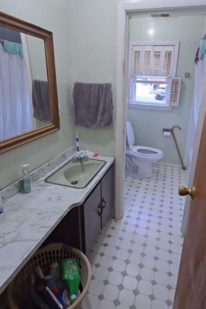narrow bathroom before remodel