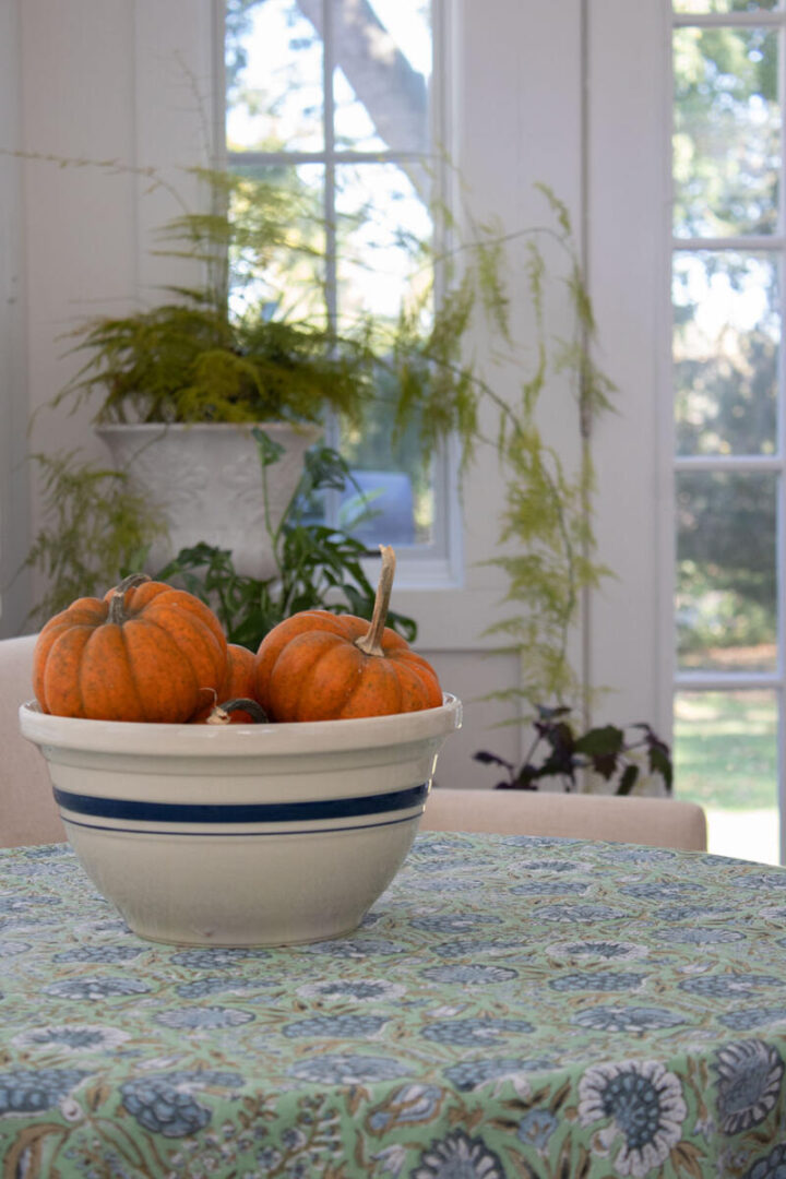 simple halloween decor - mini pumpkins in a bowl display